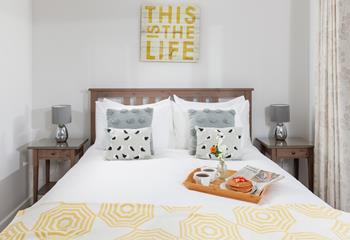 This is most definitely the life! The sumptuous king size bed promises a comfortable night's sleep.