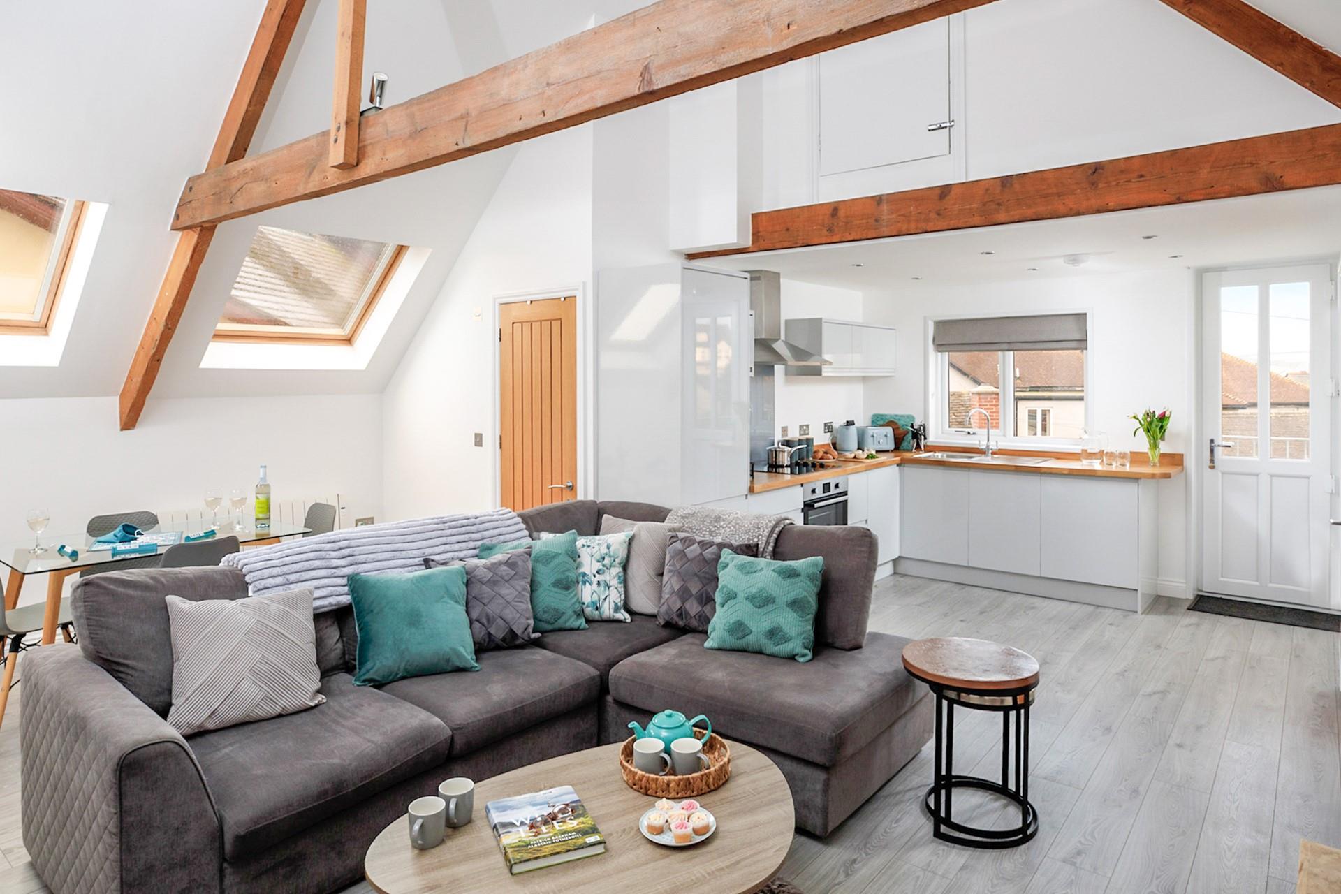 The open plan living space allows you to spend quality time together with family and friends.