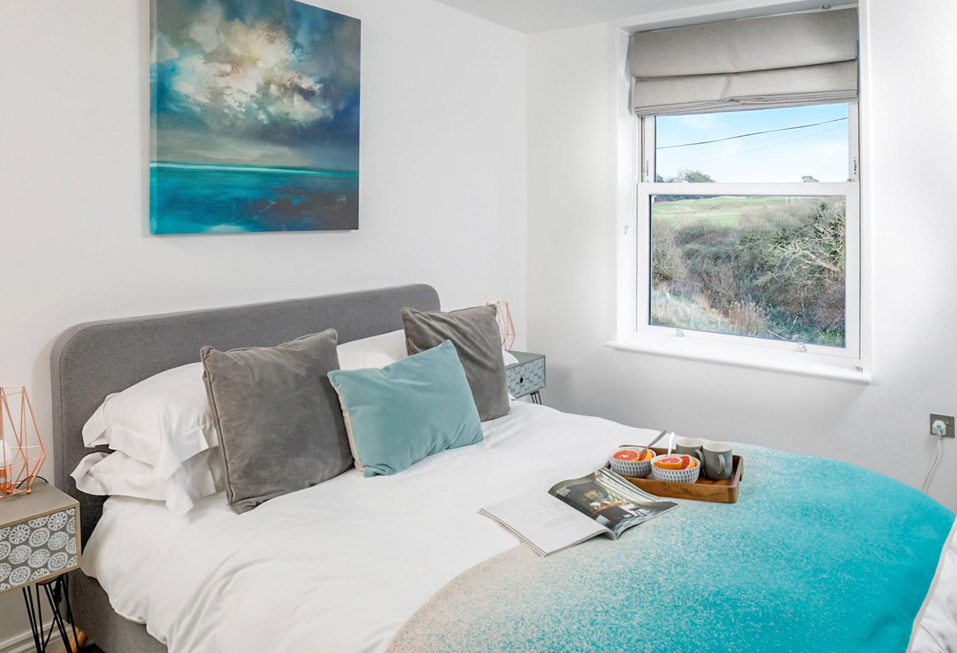 Sink into the soft sheets in the king size bed and drift into a dreamy night's slumber.