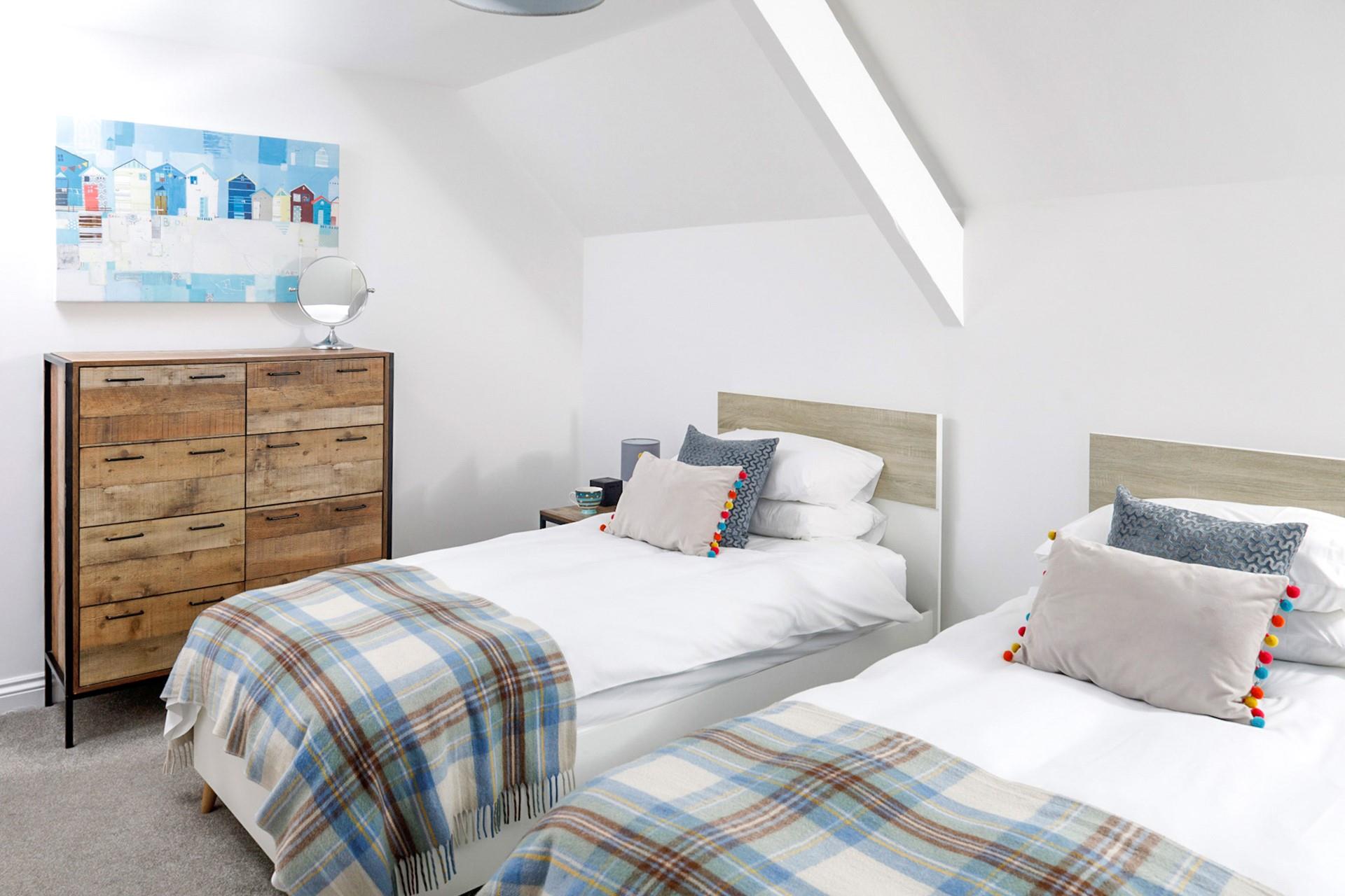 The nautical decor reflects the coastal location of Links Loft.