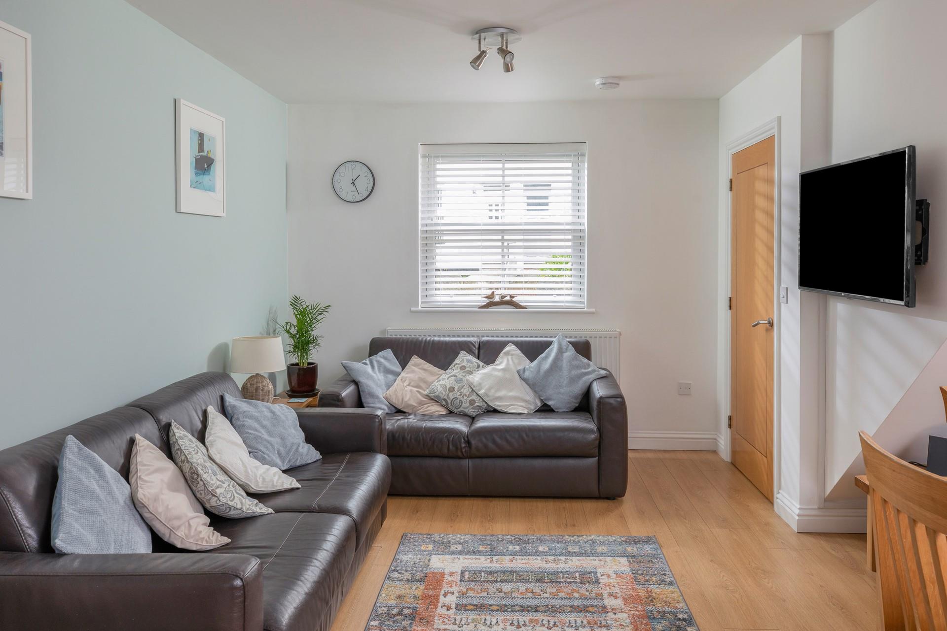 The stylish decor reflects the seaside location with cool blues.