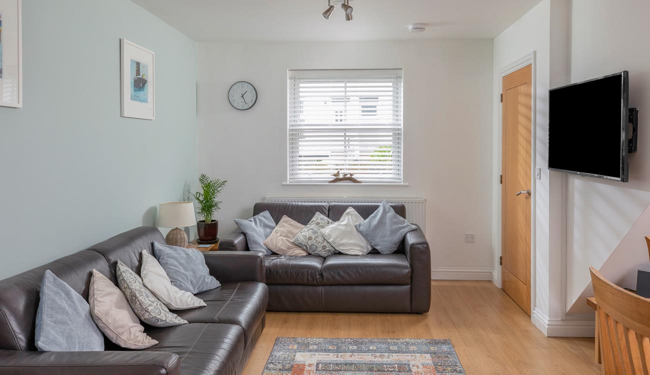 The stylish decor reflects the seaside location with cool blues.