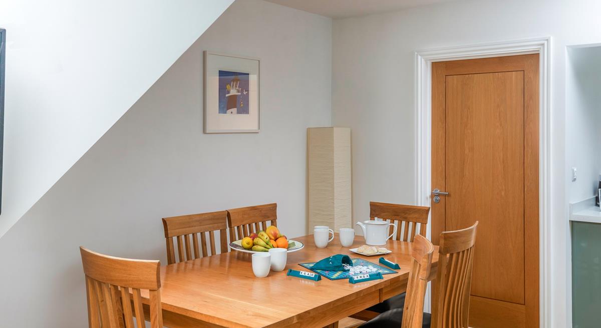 Gather at the dining table to enjoy family meals, making magical memories that will last a lifetime.