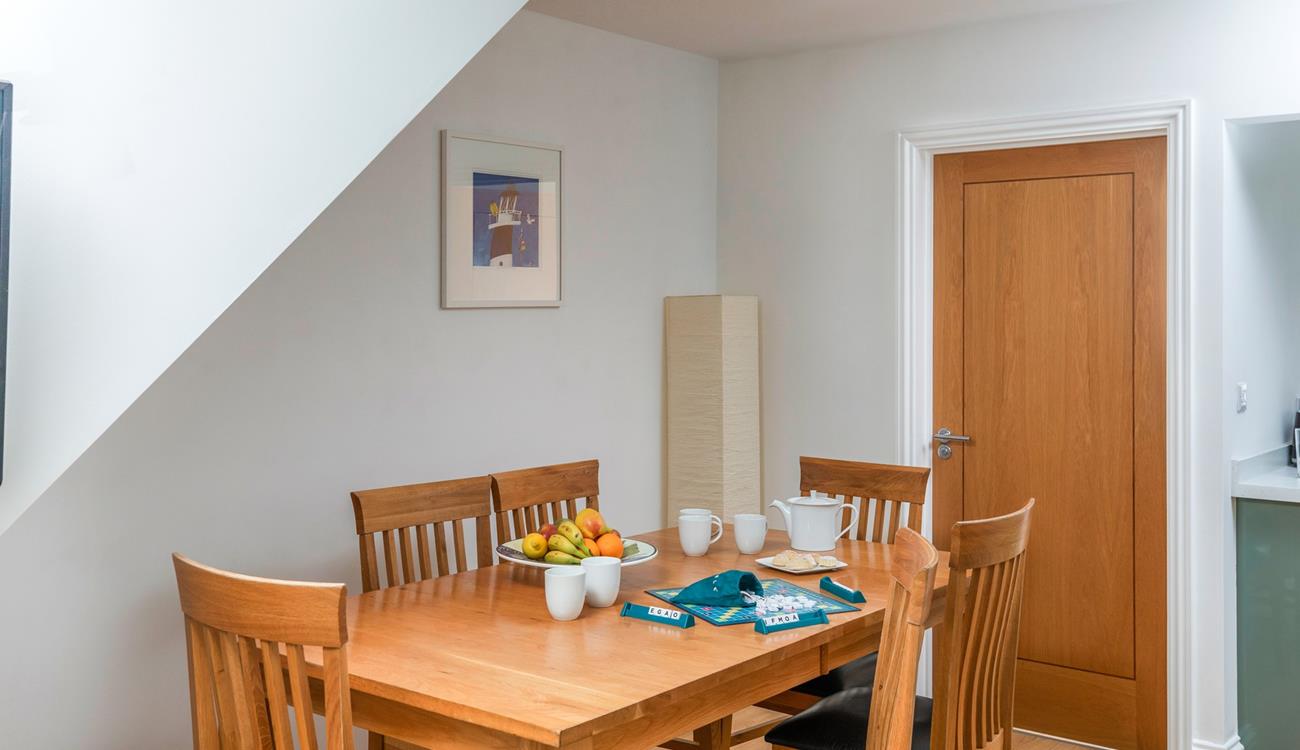 Gather at the dining table to enjoy family meals, making magical memories that will last a lifetime.