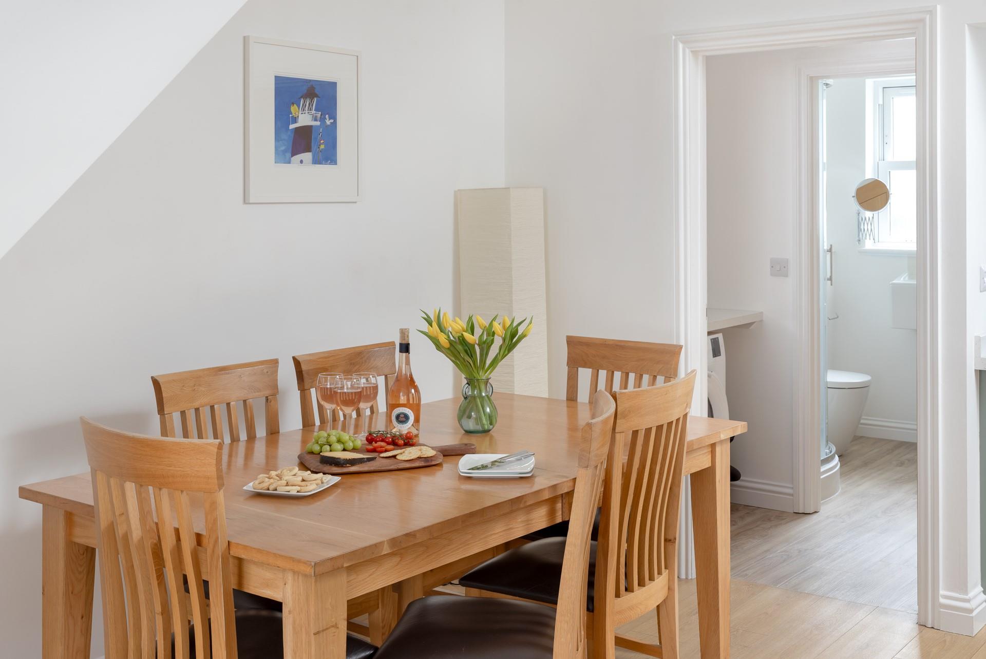 Gather at the dining table to enjoy family meals, making magical memories that will last a lifetime.