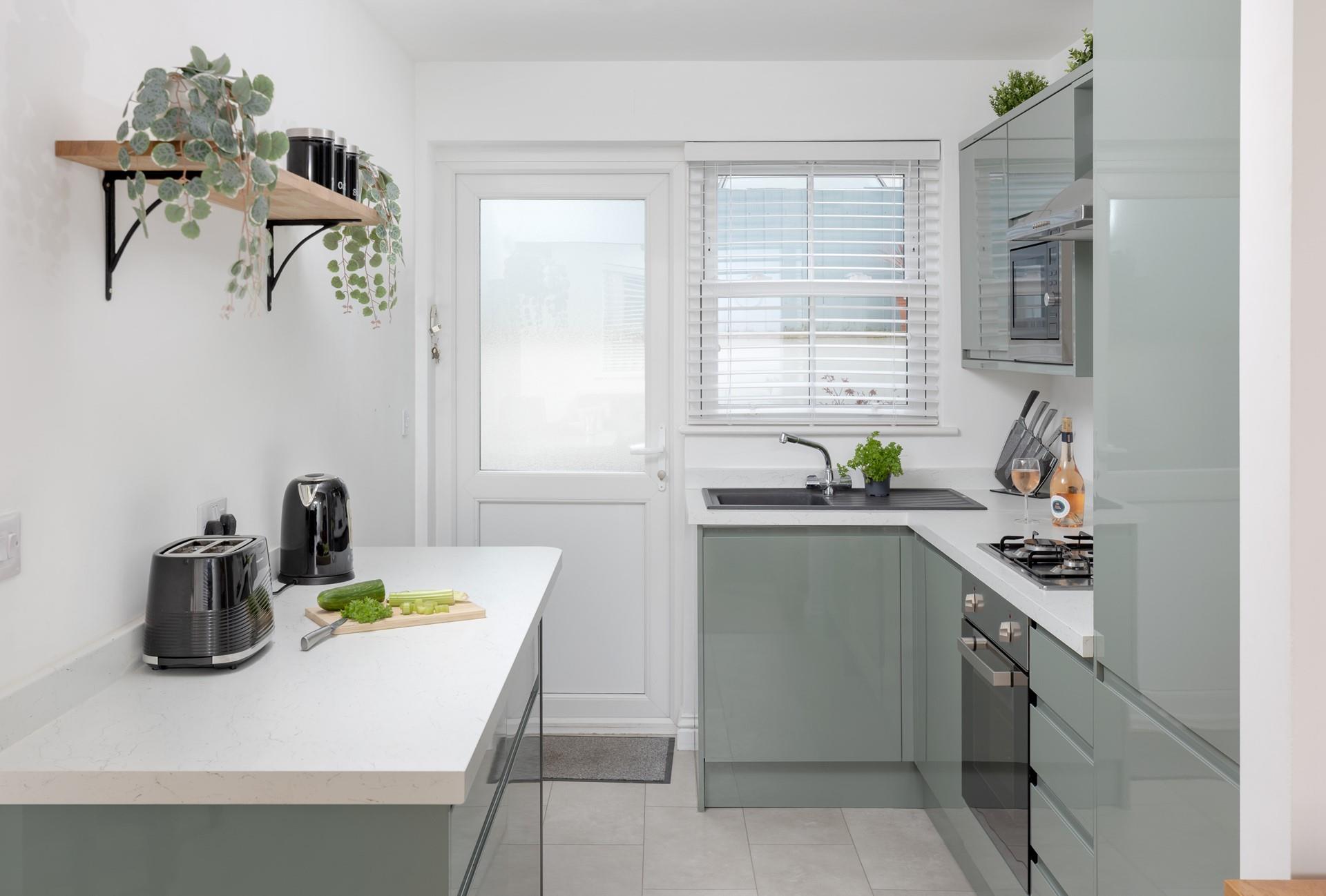 The contemporary kitchen makes whipping up delicious meals an absolute pleasure.