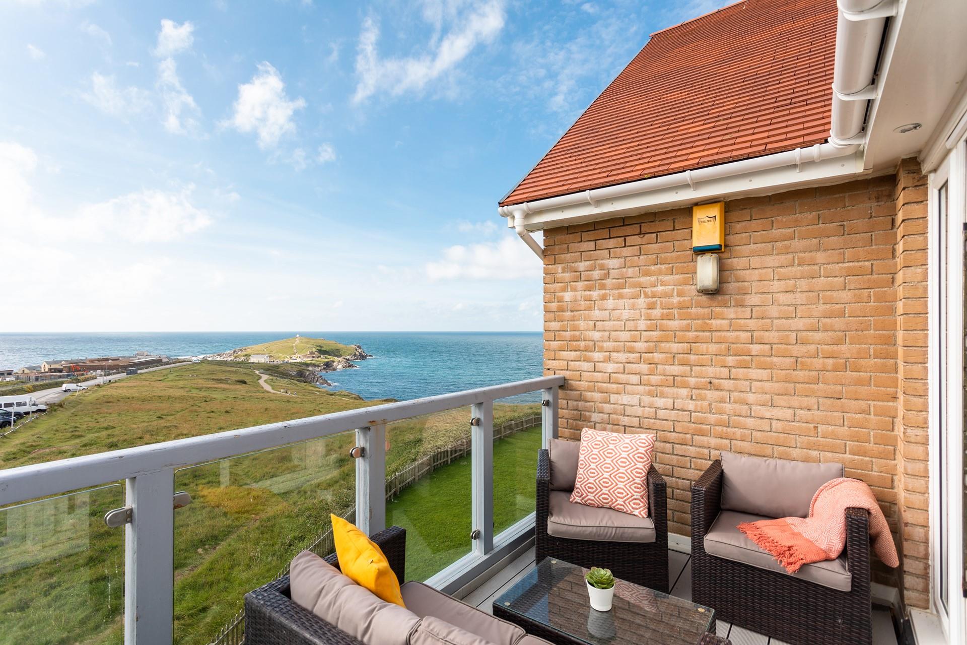 Soak up the sun and the views out on the balcony.