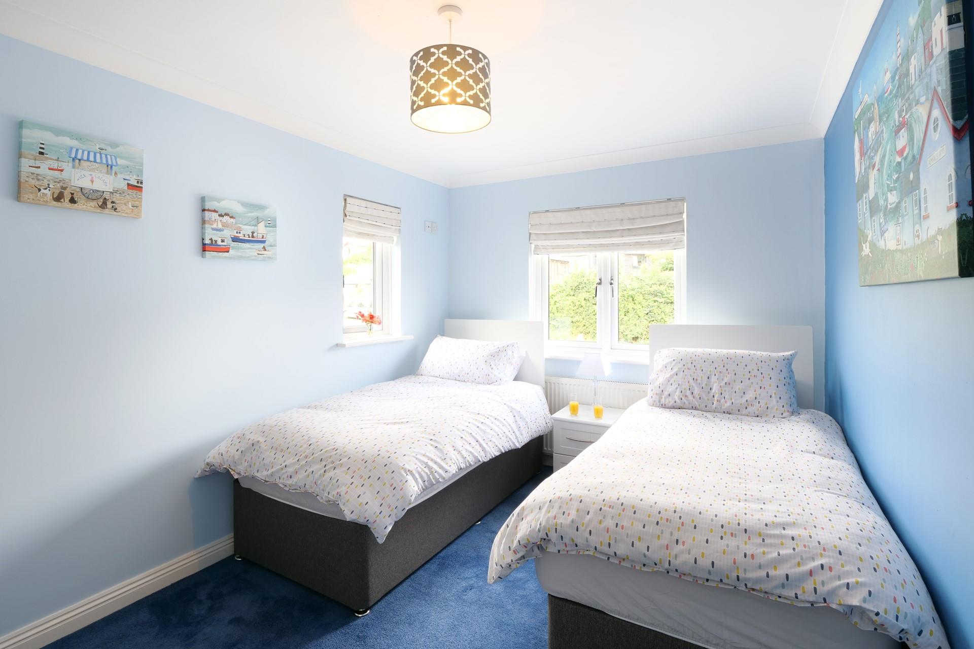 The twin beds are perfect for young adults or children.