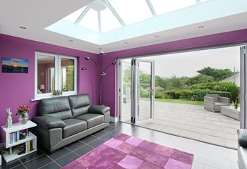 Open the bi-fold doors and let the warm summer breeze into the kitchen.