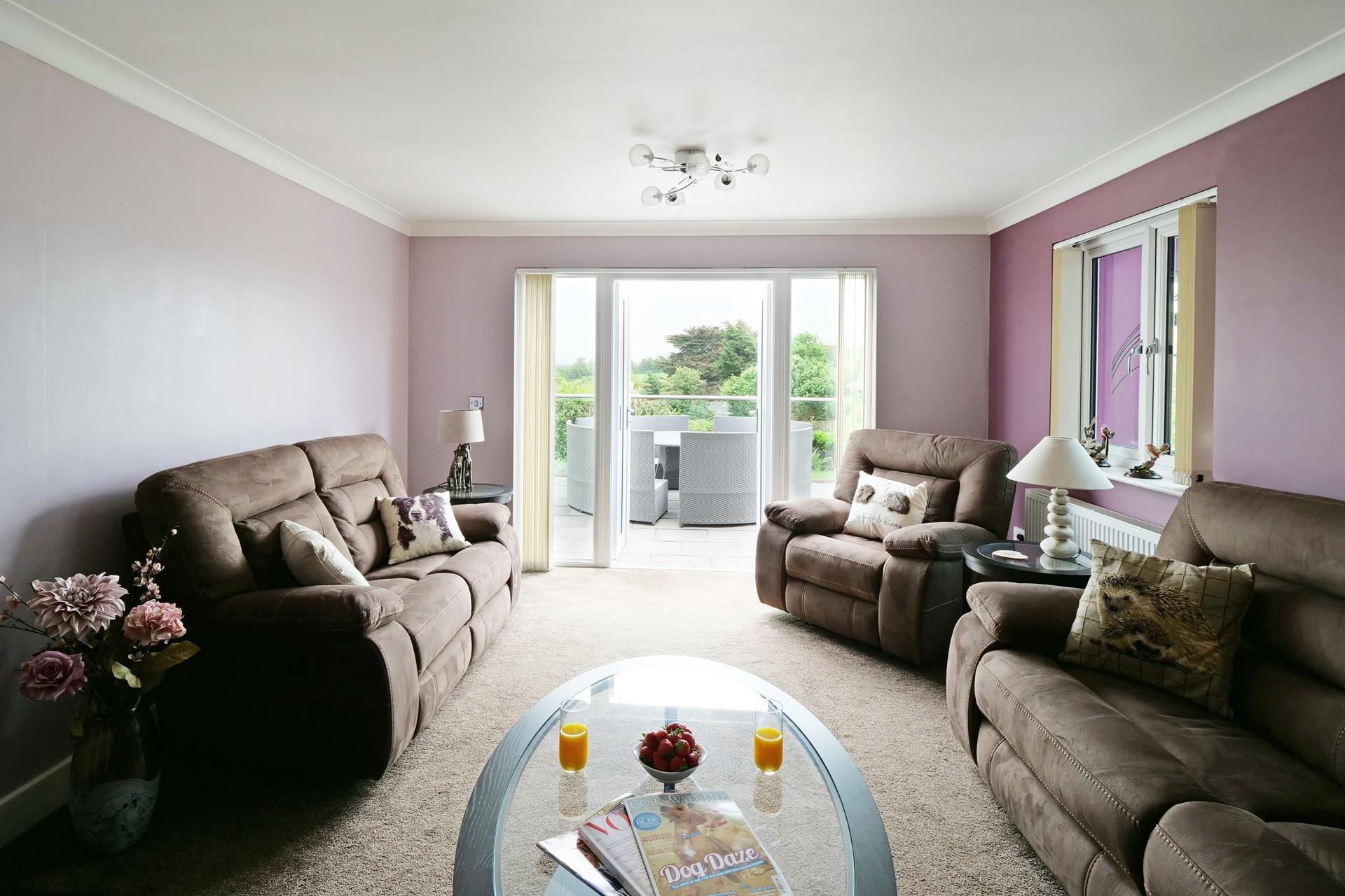 The sitting room is comfortable and perfect for spending quality time as a family.