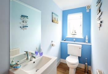 We love the coastal theme in the ground floor cloakroom.