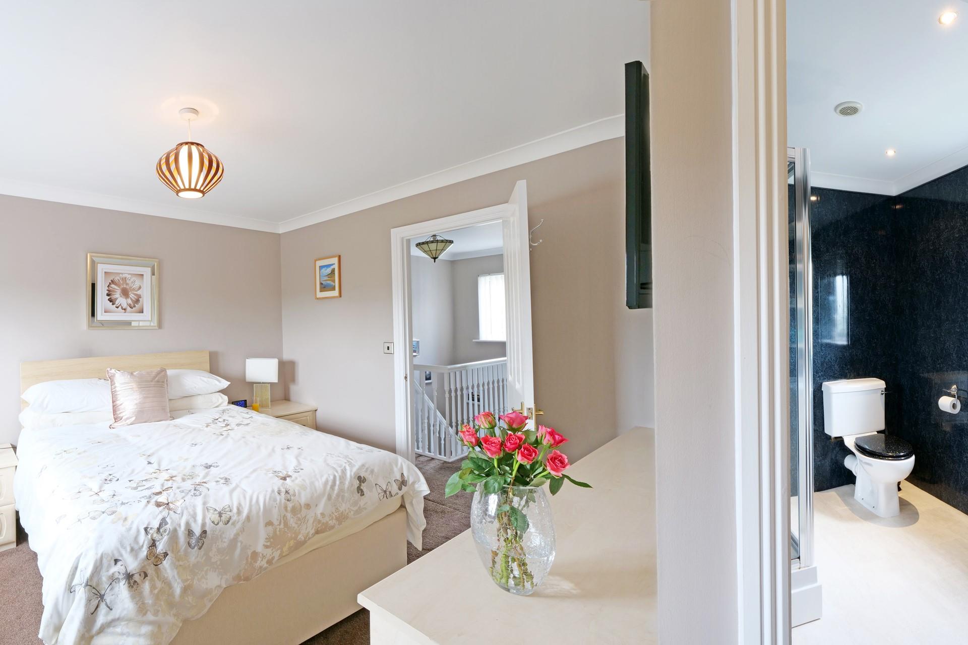 The double bedroom benefits from an ensuite shower room. 