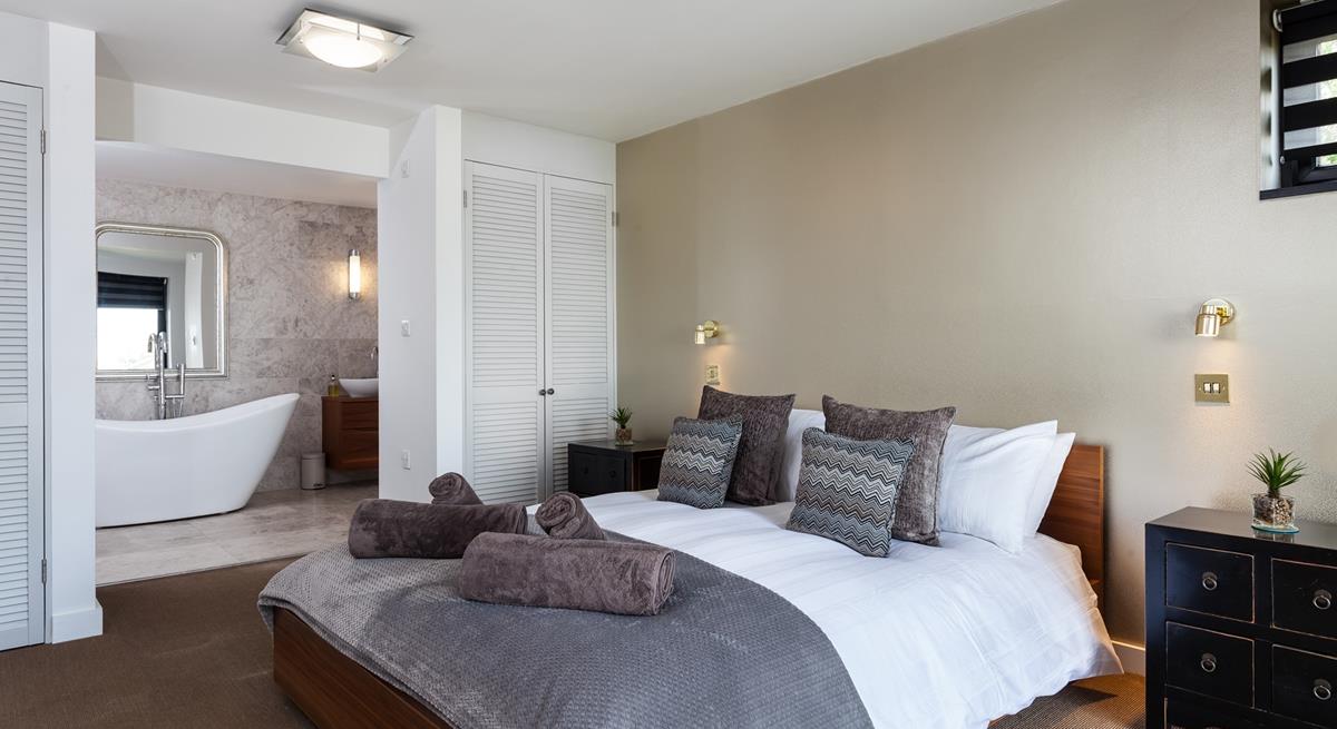 Sink into the soft sheets of the king size bed and drift off for a peaceful night's slumber.