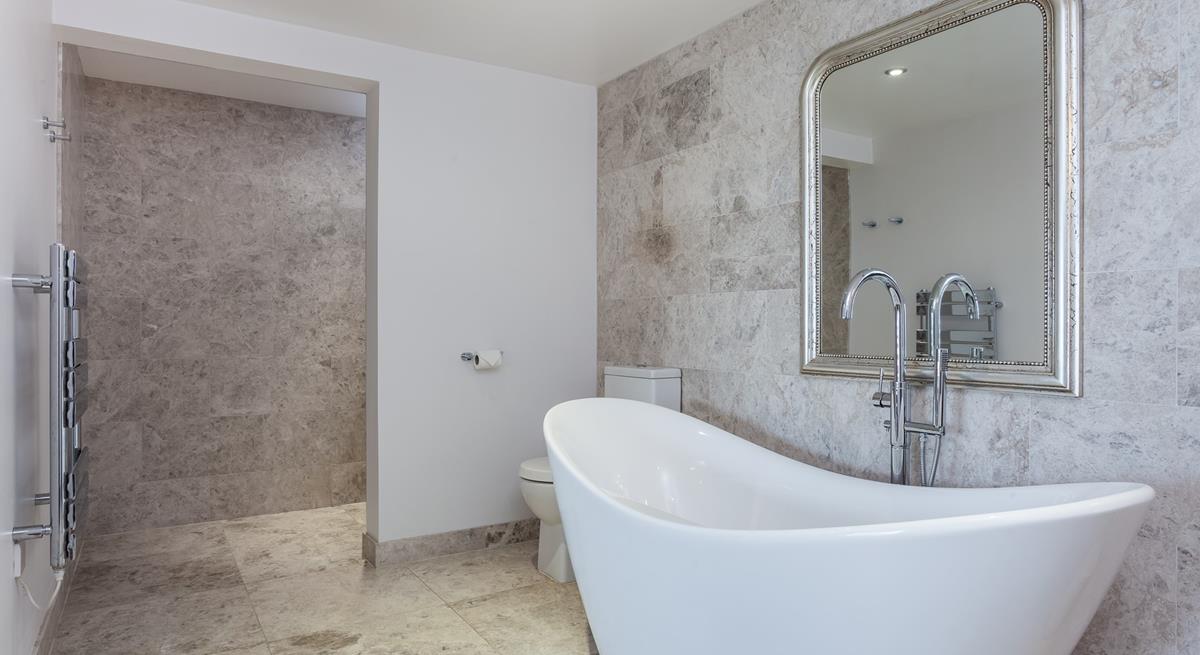 Enjoy fresh warm towels straight from the heated towel rail after a relaxing bubble bath.