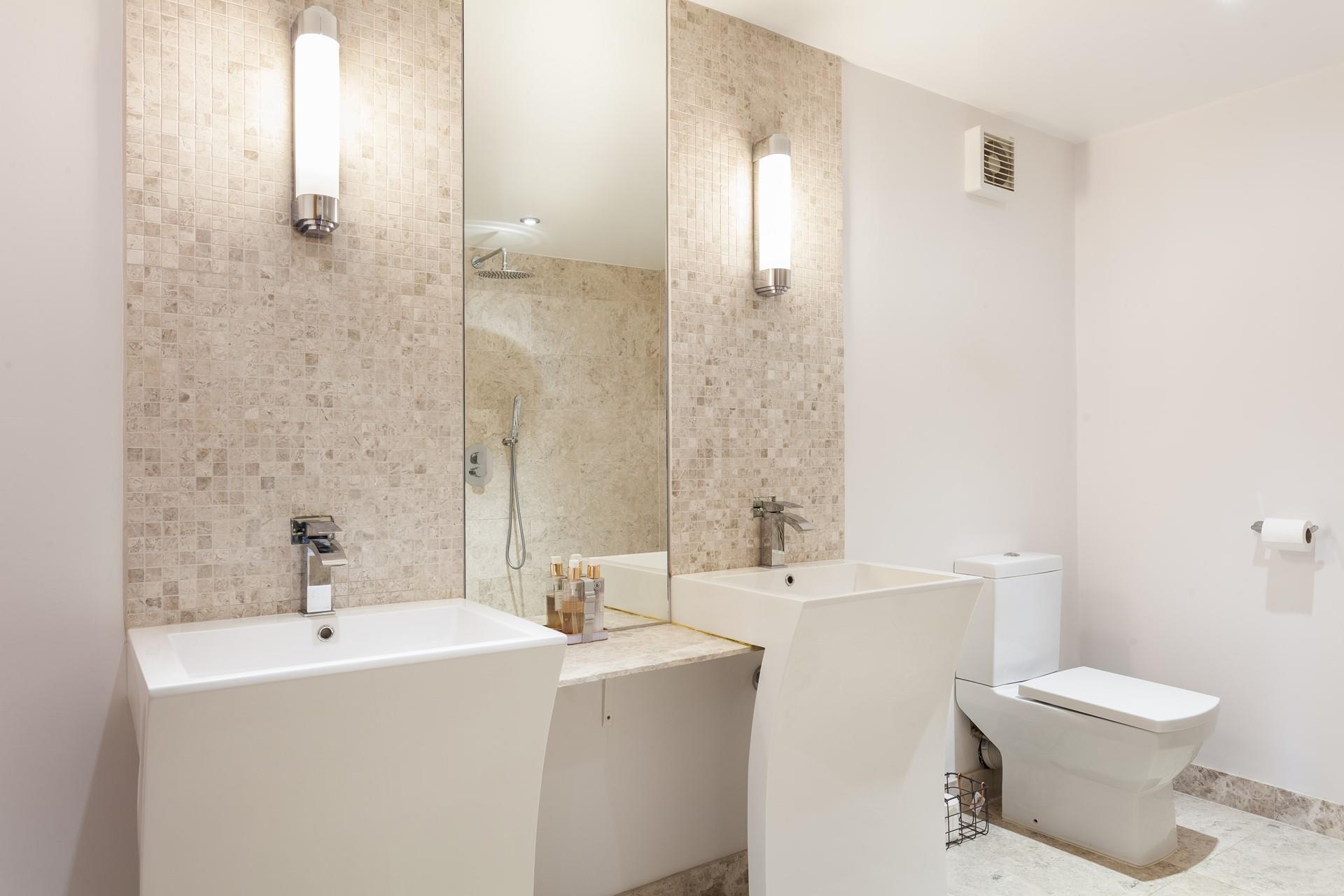 Get ready for the day in the stylish bathroom and then head into St Ives to explore its quaint shops.
