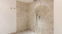 The ensuite from bedroom 4 has a walk-in wetroom which has a luxurious rain head shower.