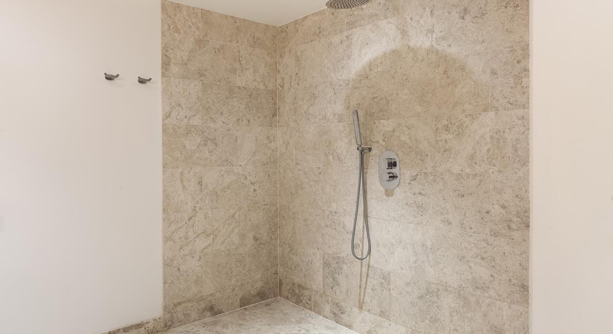 The ensuite from bedroom 4 has a walk-in wetroom which has a luxurious rain head shower.
