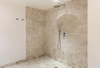 The ensuite from bedroom 4 has a walk-in wetroom which has a luxurious rain head shower.