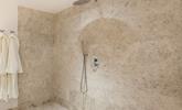 Beautiful tiling in the wetroom creates the ultimate spa experience. - Thumbnail Image