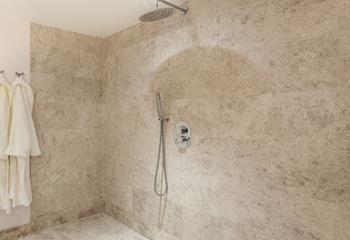 Beautiful tiling in the wetroom creates the ultimate spa experience.