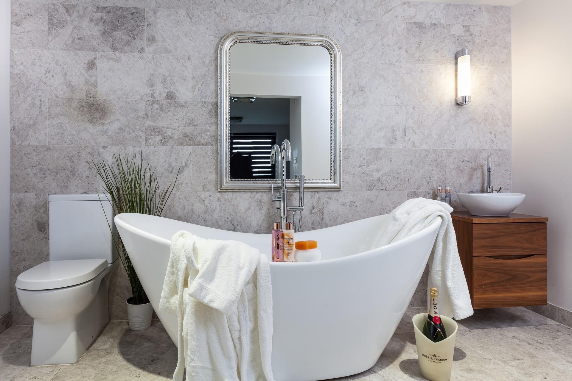 As well as a luxurious bathtub, there is an invigorating rainfall shower to wake you each morning.