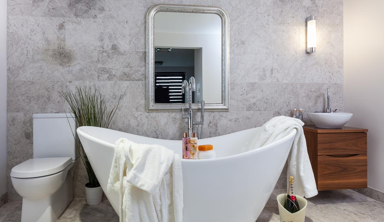 As well as a luxurious bathtub, there is an invigorating rainfall shower to wake you each morning.