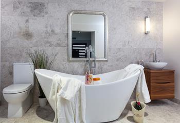 As well as a luxurious bathtub, there is an invigorating rainfall shower to wake you each morning.