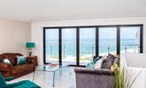 The sitting room takes advantage of the stunning views over Porthmeor. - Thumbnail Image