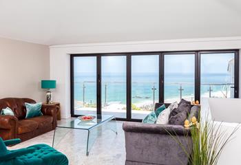 The sitting room takes advantage of the stunning views over Porthmeor.