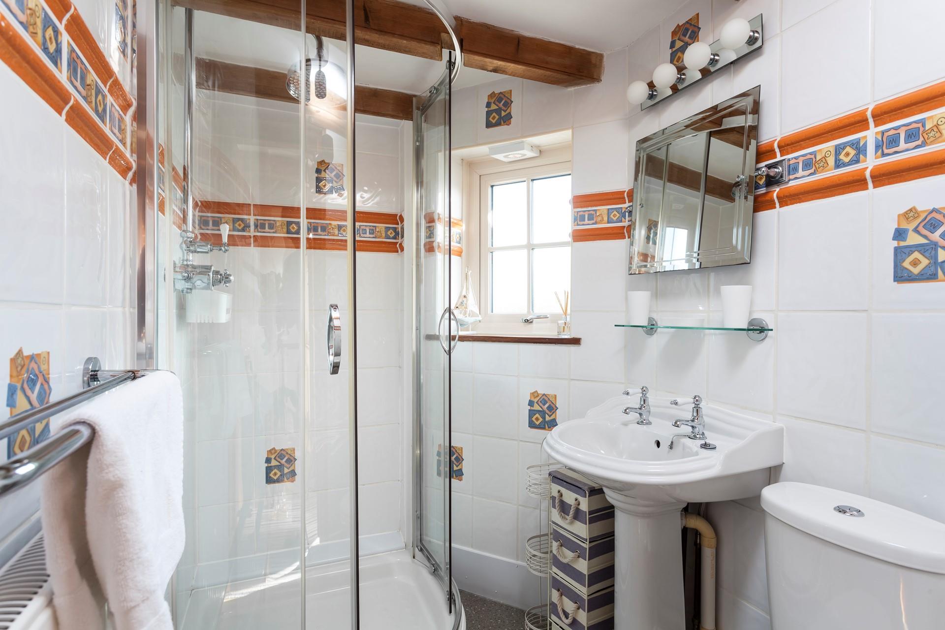 Wash off the sand from a day at Carbis Bay beach.