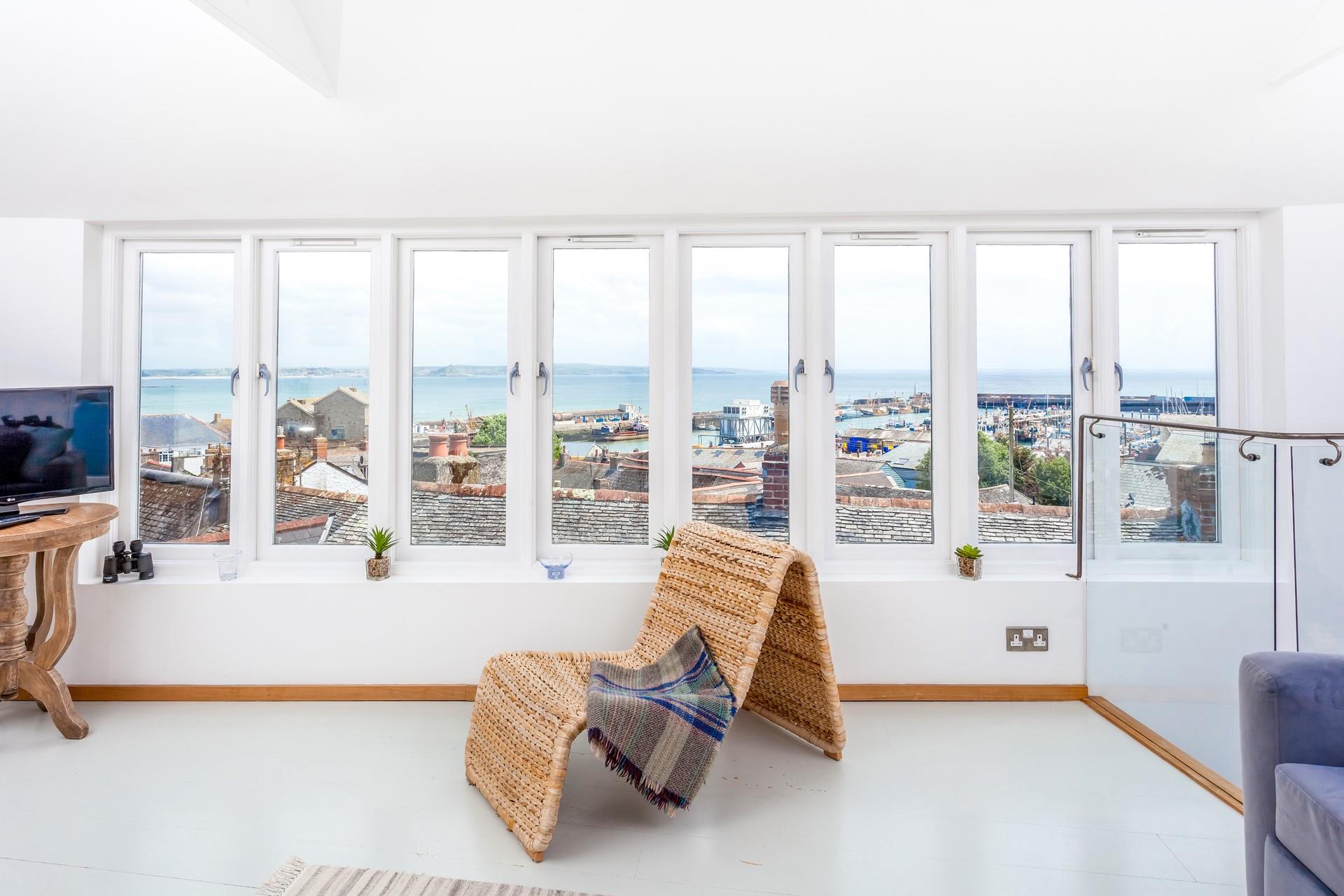 Step into The Blue Place and be met with incredible views over Newlyn and Mount's Bay.