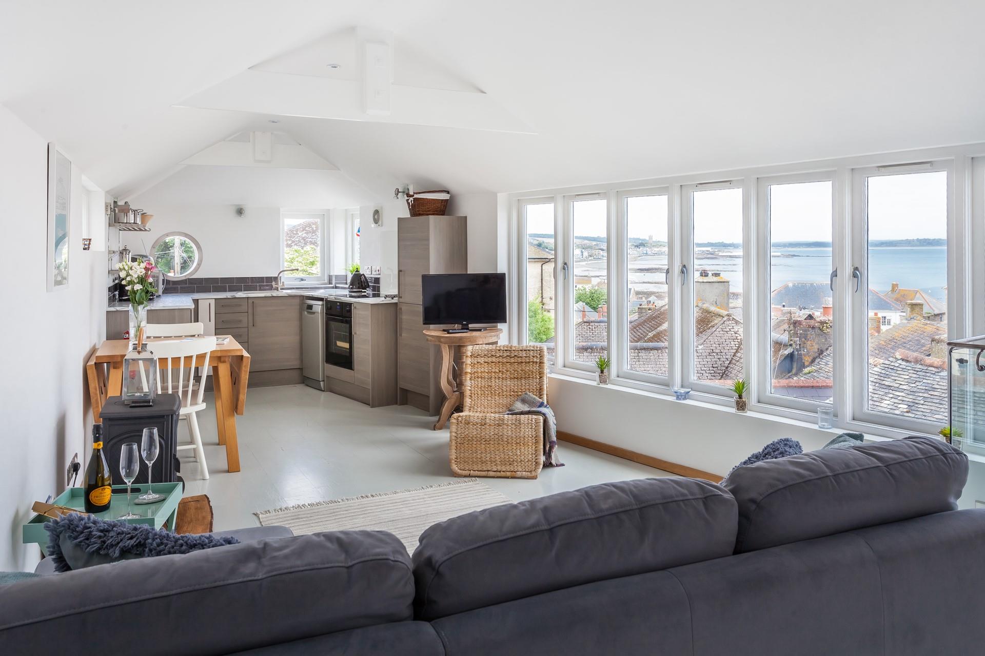 The open plan living space is perfect to enjoy quality time together cooking and spending cosy evenings in.