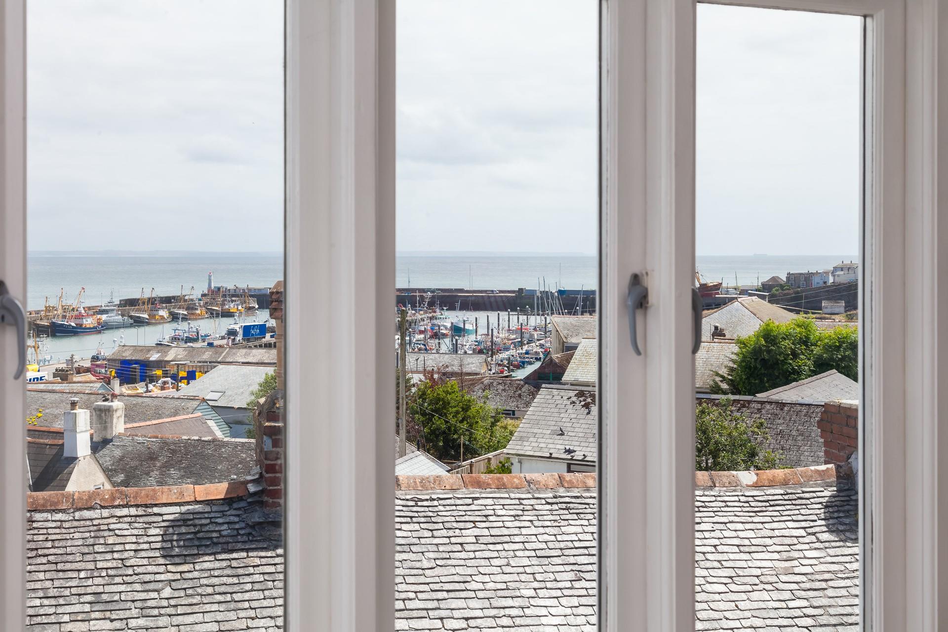 Rooftop views out to sea and across Mounts Bay from the open plan sitting/dining room.