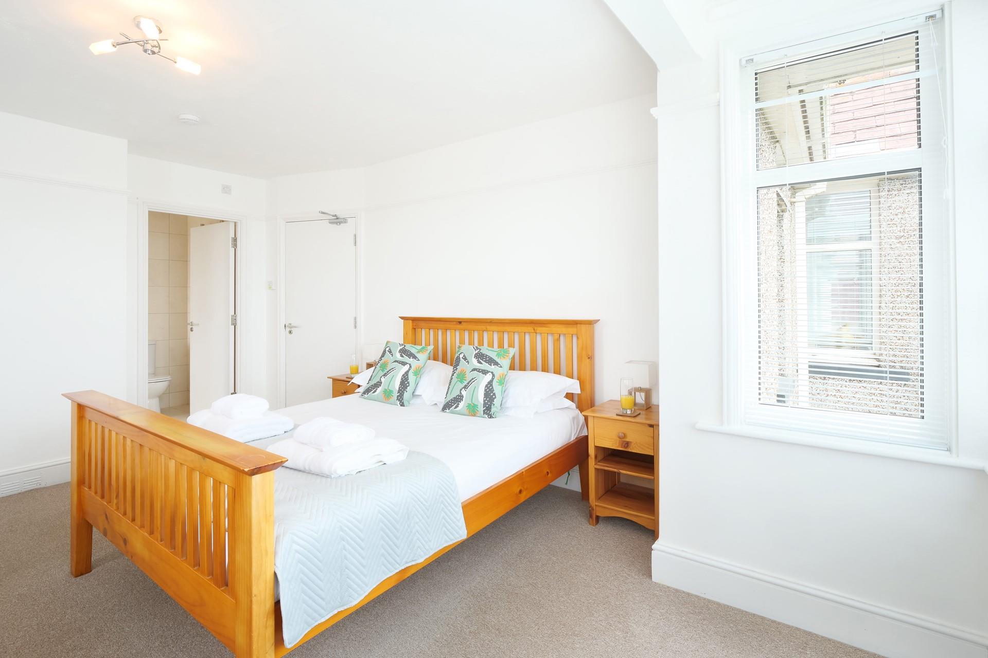 Climb out of the soft sheets and into the en suite to get ready for the day.