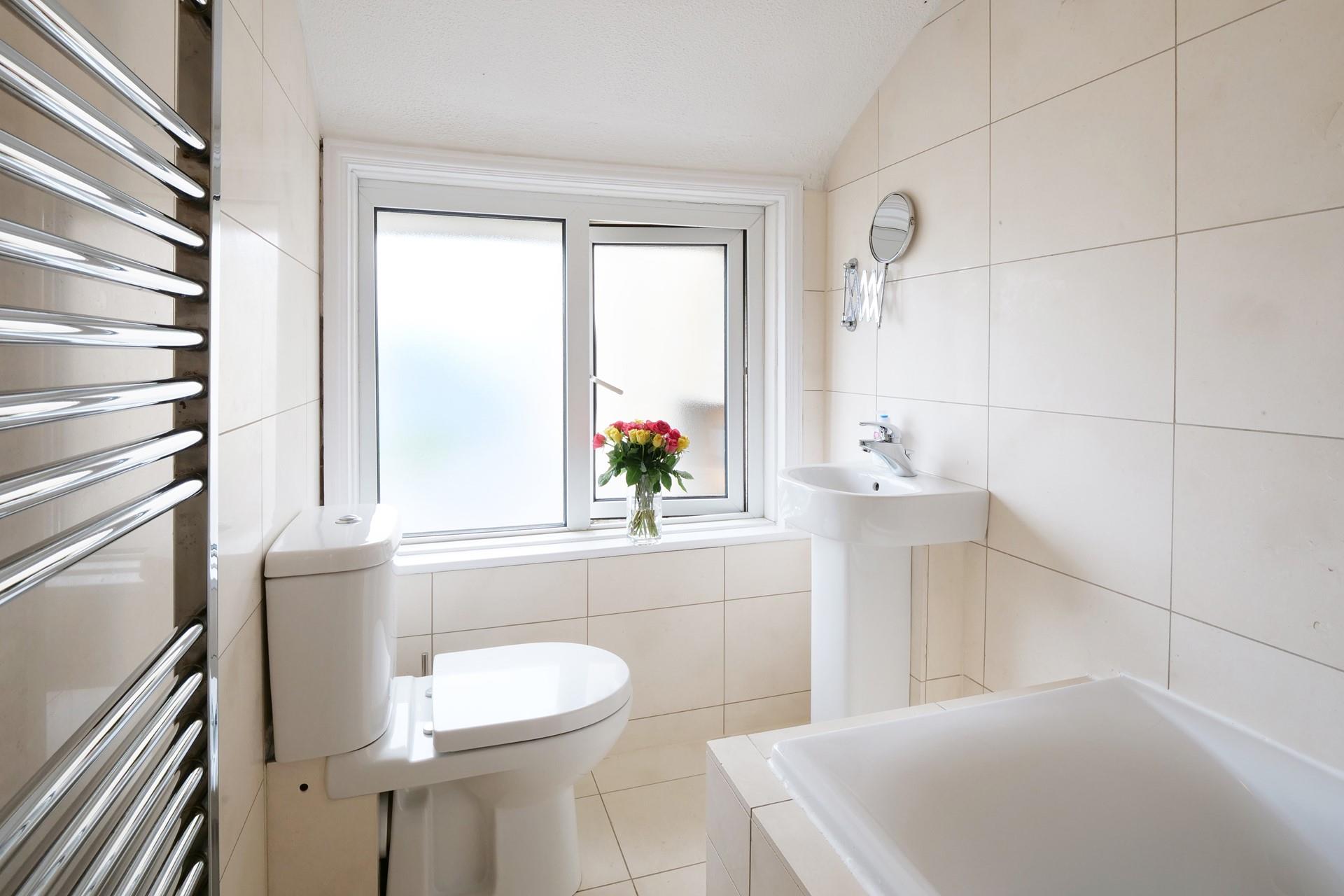 The family bathroom has a bath to relax in on winter evenings.