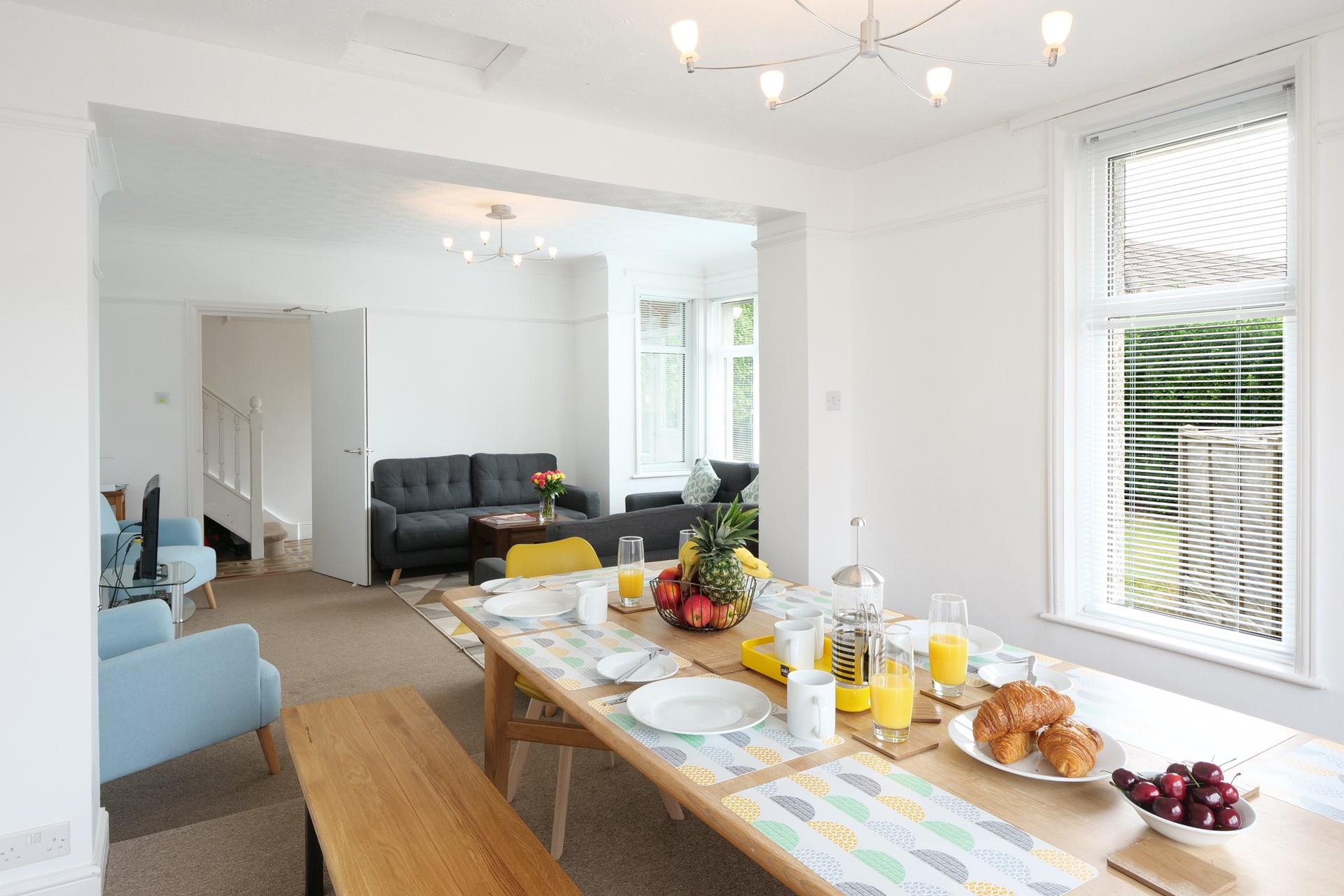 Gather around the spacious dining table and tuck into delicious warm pastries.