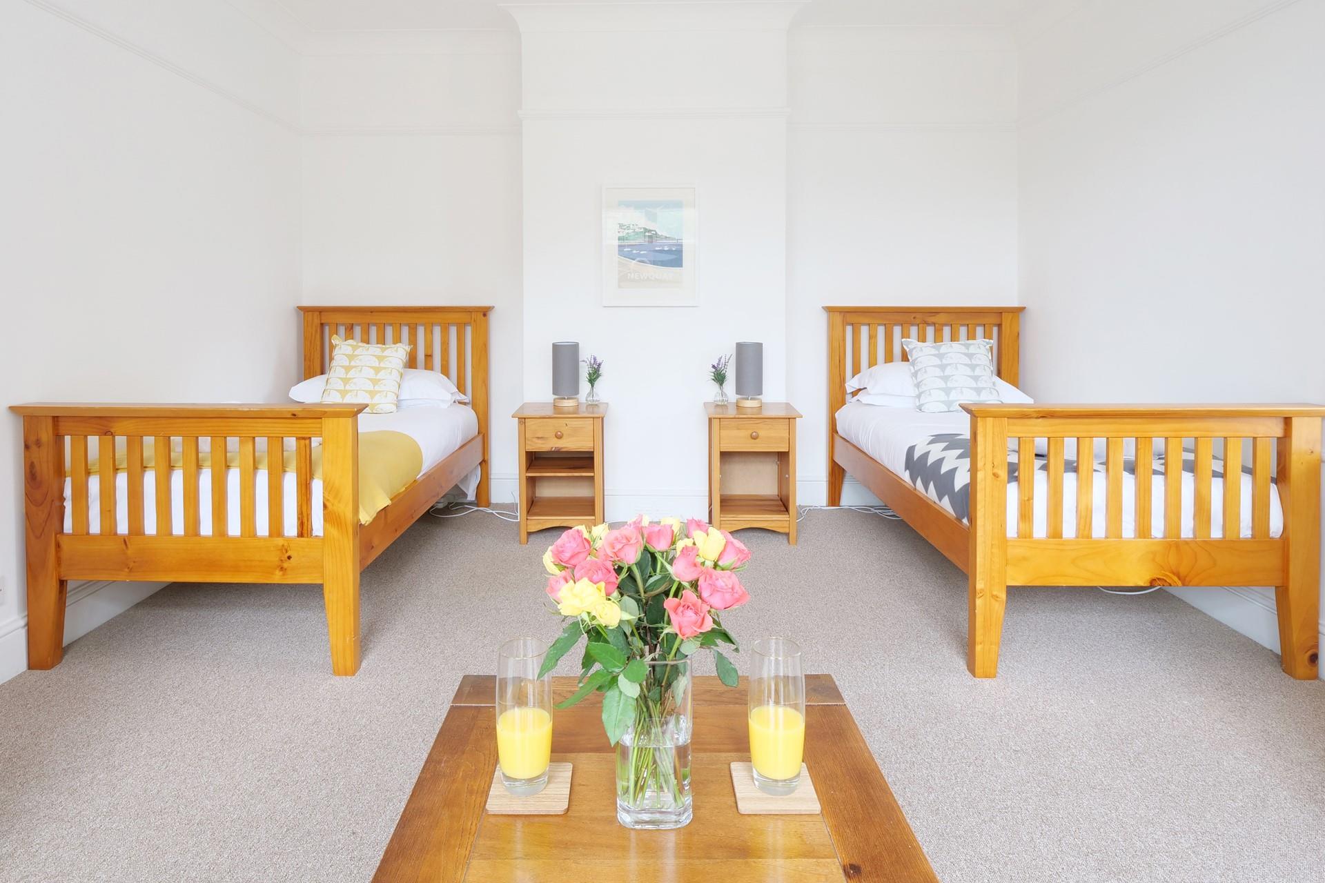 Bedroom 1 has twin beds perfect for adults or kids to tuck into.