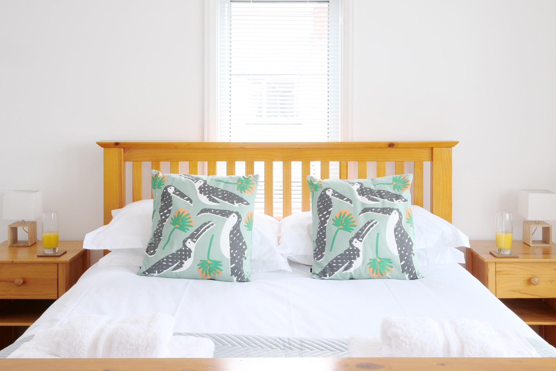Tuck into the soft sheets of the double bed after a day on Summerleaze beach.