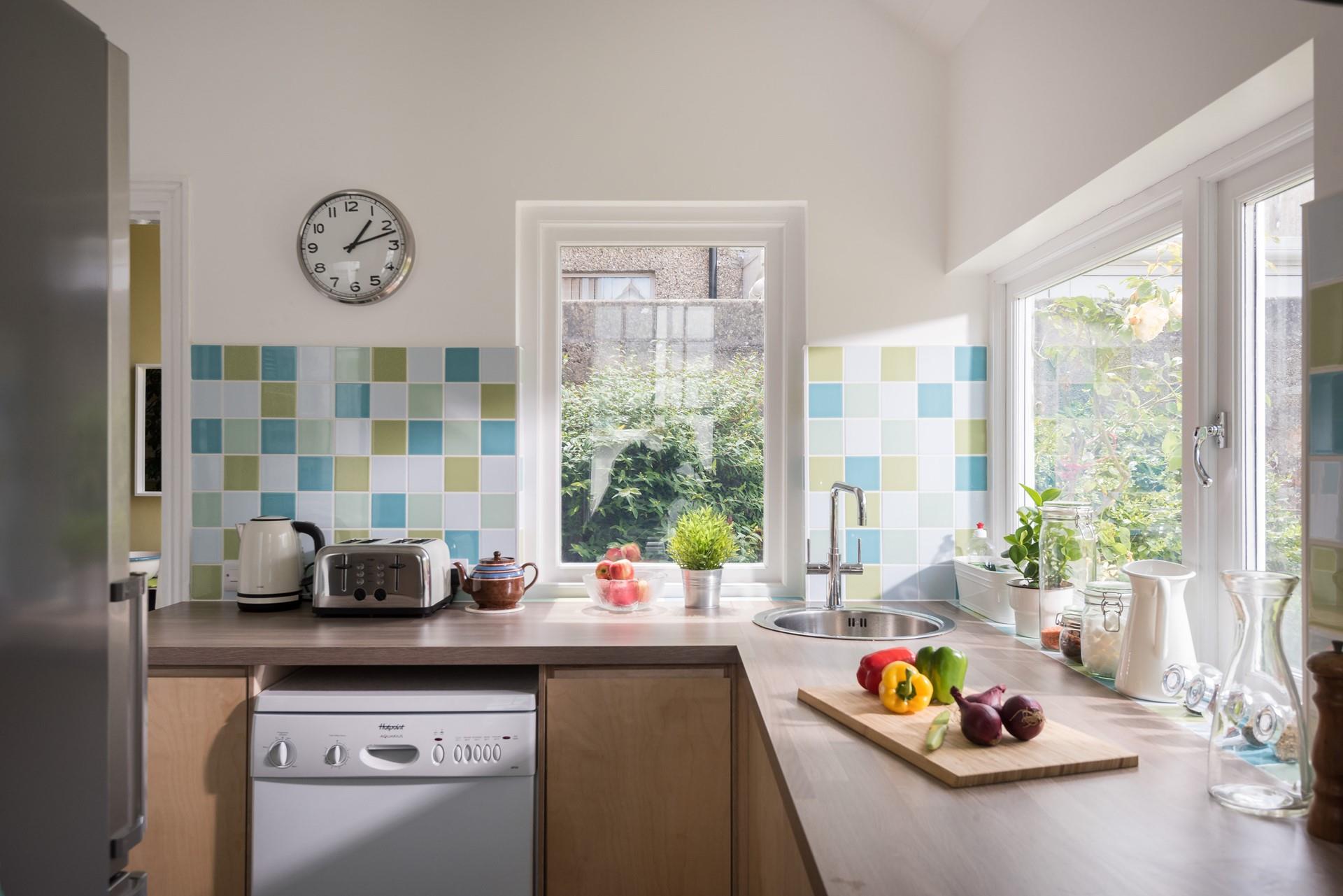 Though compact, the kitchen is well-equipped, providing everything you could need for preparing meals.