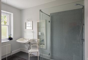 The family shower room on the first floor has a large walk-in shower, perfect for washing away the sand after a day on the beach.