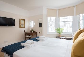 You can sit and write a postcard at the quaint desk in bedroom 3. 