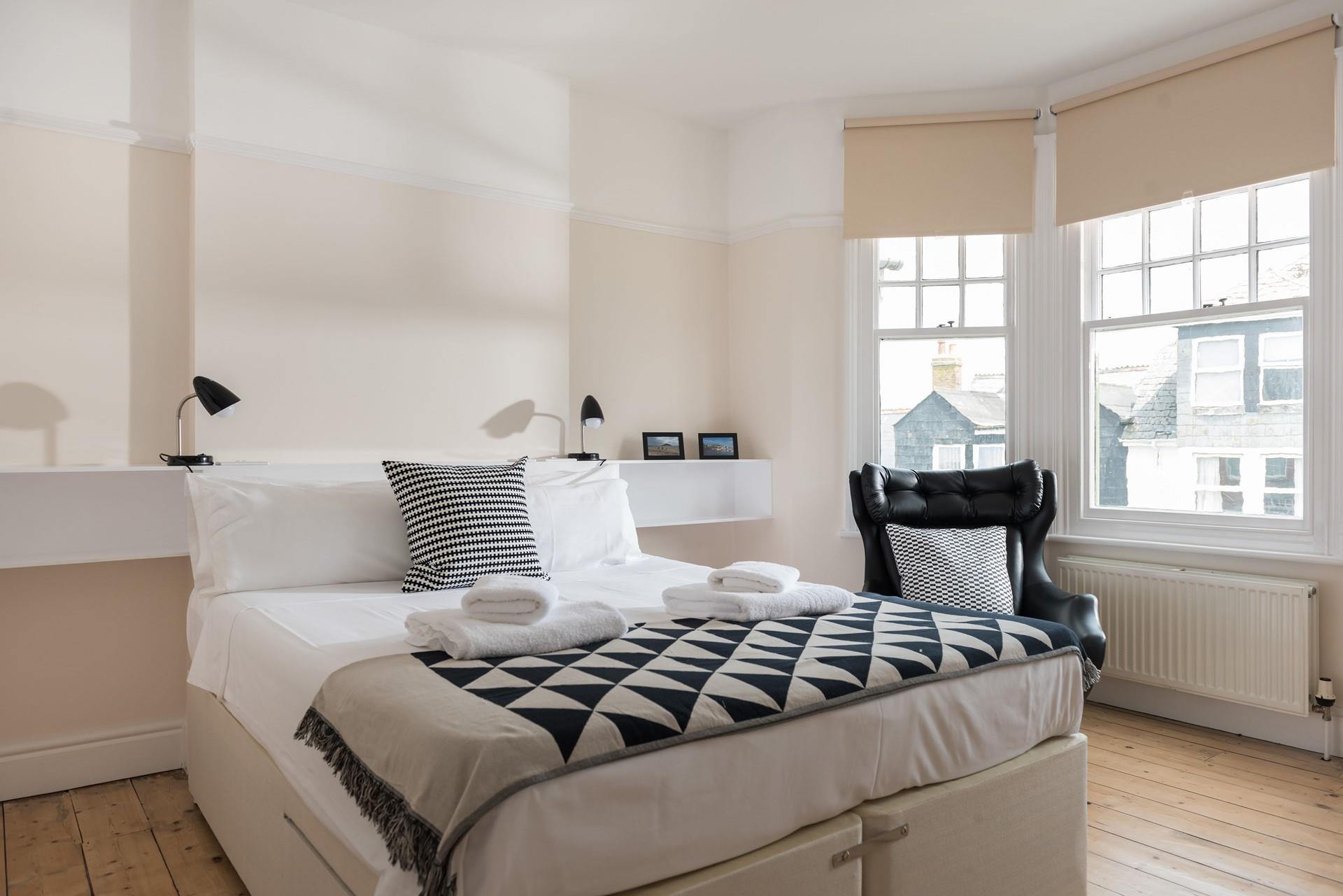 A geometric theme to bedroom 4, adds a modern twist to this superb family home. 