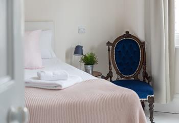 Bedroom 1 is on the ground floor and decorated in pretty pastel tones with a touch of Victorian class.