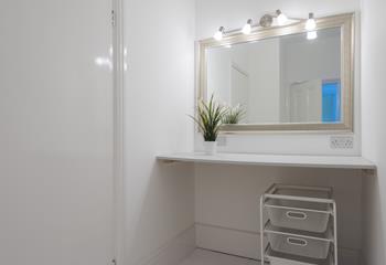 A dressing room with a place for leaving all your essentials is perfect for getting ready for a night out. 