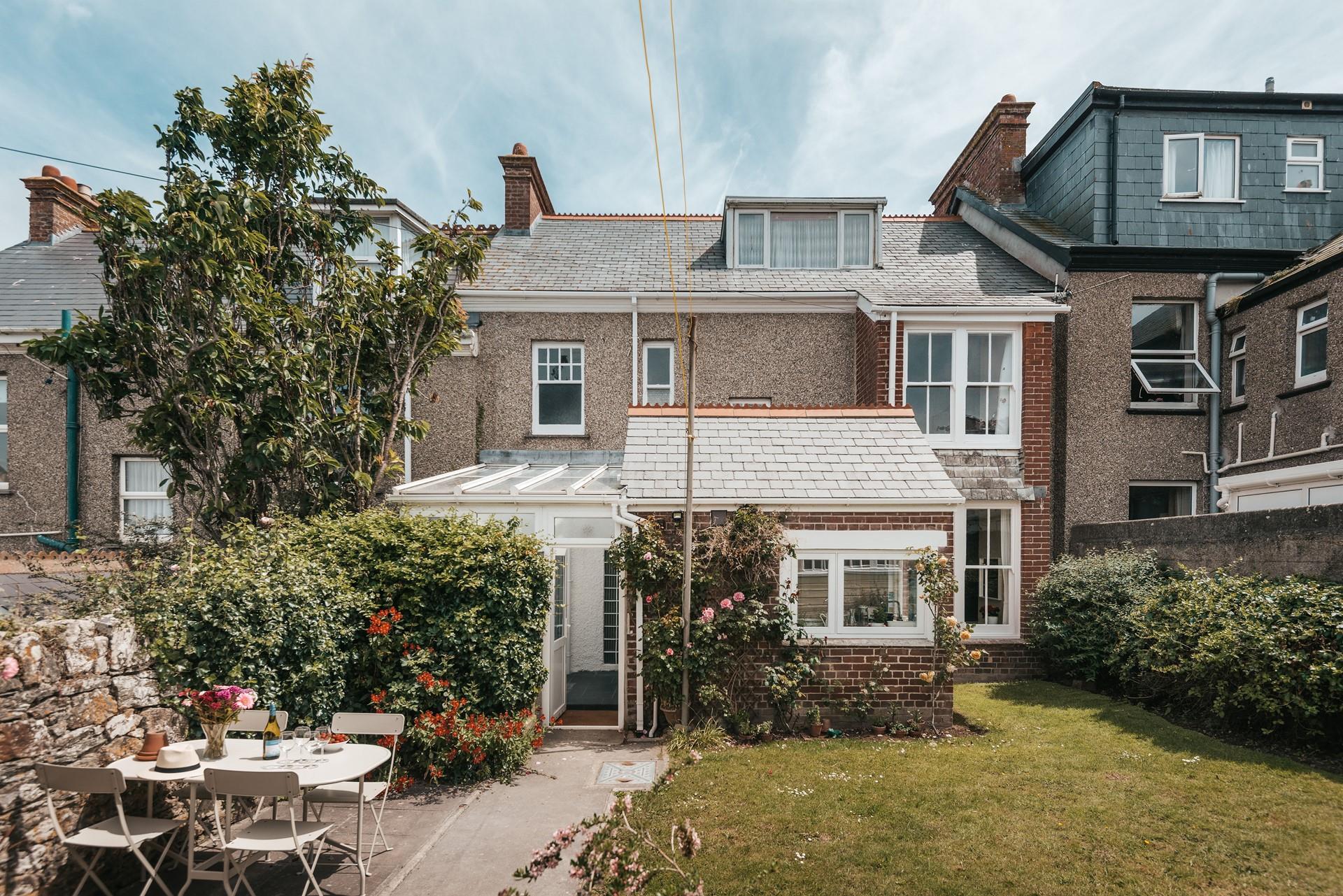 The pretty enclosed garden is a great little sun trap for enjoying some evening nibbles. 