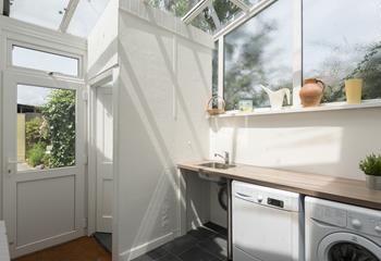 The utility room leads out to the garden and is great for storing boots and bodyboards in.