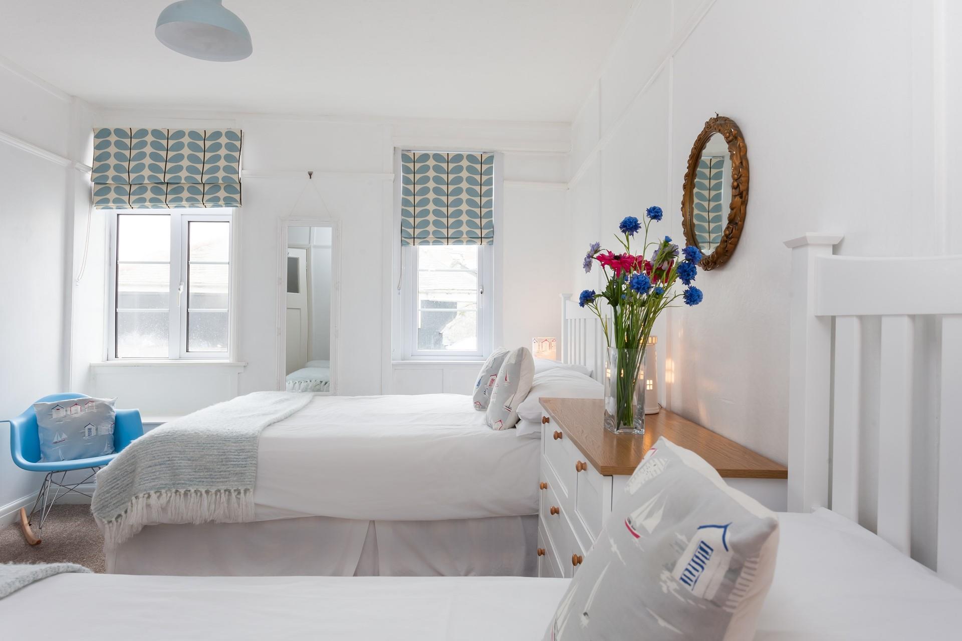 Whites and pastel shades create a calming and luxurious finish. 