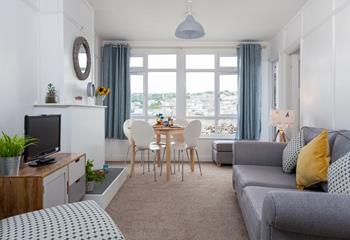 Relax in the cosy living room with views over the rooftops of St Ives.