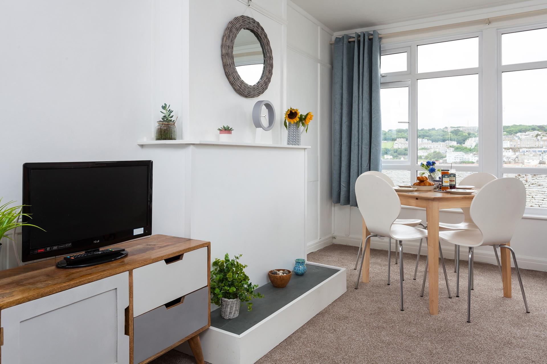 Bright and airy, the sitting room has a calm and relaxing environment. 