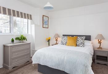 The beautifully finished bedroom makes for the ultimate place for rest and relaxation.